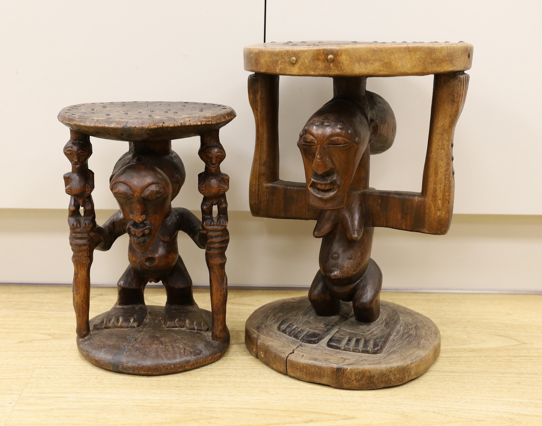 Two Songye (African) tribal stools, carved from the solid, tallest 42cm